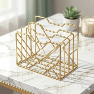 A decorative gold wire file folder holder used for stylish tabletop document organization.